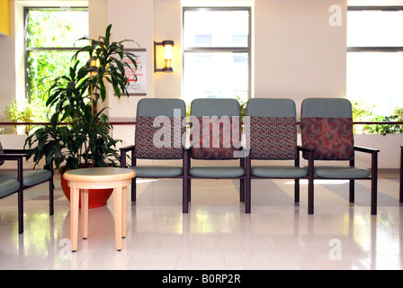 Waiting room in a hospital or clinic with empty chairs Stock Photo