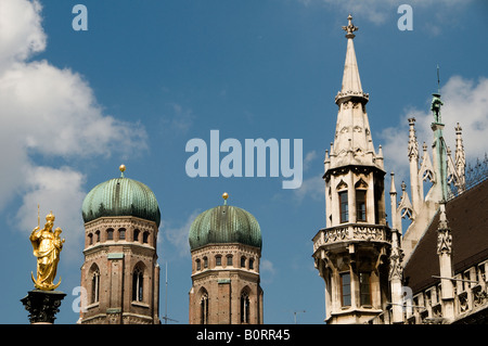 Statue of St Mary with Frauenkirche Church of Our Lady and Rathaus town hall in Marienplatz, in the city of Munich capital of  Bavaria. Germany Stock Photo