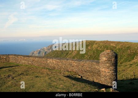 Stone fence protecting the cliffs of Garita de Herbeira in the north of Galicia, Spain Stock Photo