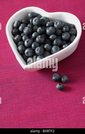 Blueberries in heart shaped bowl Stock Photo