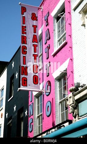 Sign on tattoo piercing studio in Camden Town London Stock Photo