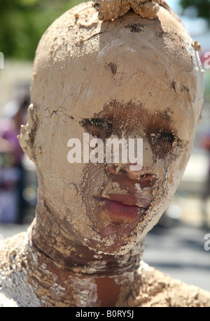 Carnival participants dressed up as a mummy performs during Carnaval Vegano, an annual carnival in La Vega, Dominican Republic Stock Photo
