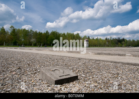 Concrete marker where prisoners barrack buildings stood in Dachau concentration camp, Bavaria, Germany Stock Photo