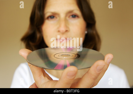 Woman holding disc Stock Photo