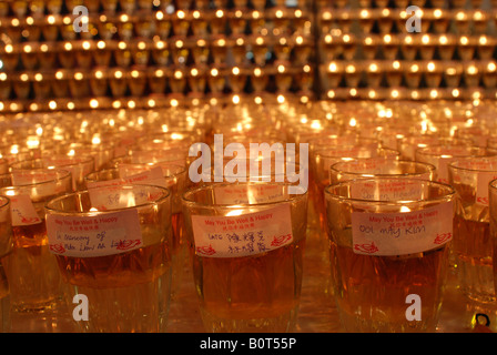 Oil Lamps Illuminated On Wesak Day Celebration Stock Photo