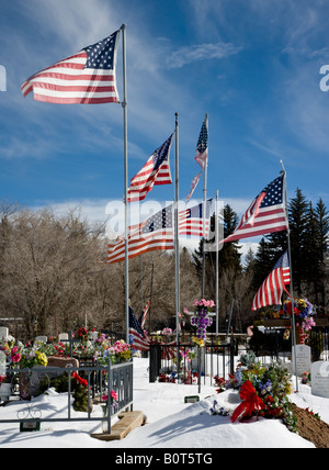 American war veterans Graveyard with flags and snow, Taos, New Mexico, USA Stock Photo