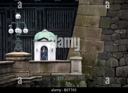 Guard on duty in sentry box at entrance to Imperial Palace in central Tokyo Japan 2008 Stock Photo