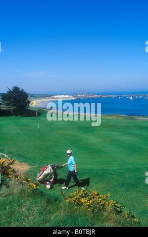 golf course and Braye Harbour, Alderney Island Stock Photo