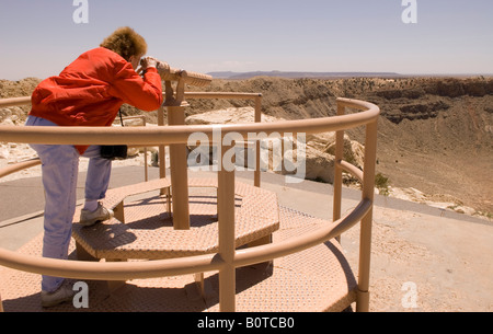 Caucasian Woman (50-60) Views Meteor Crater Arizona USA Stock Photo
