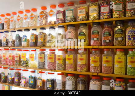 Jars Of Sweets On Shelves At Traditional English Sweet Shop in the uk Stock Photo