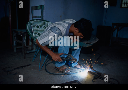 Rural welding and metal workshop supported by christian aid in rural Bangladesh Stock Photo