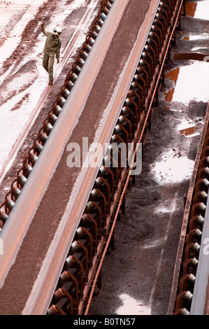 Conveyor belts are used to move iron ore on to trains at Carajá s Vale Stock Photo