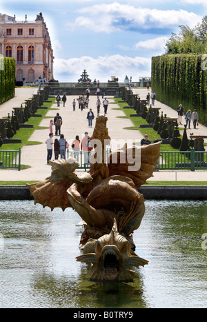 The view up to the Palace from the The winged dragon fountain in the gardens of Versailles Paris France Stock Photo