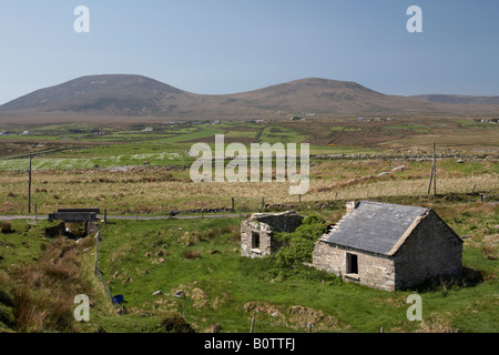 old abandoned irish slate roof cottage in wild countryside county mayo republic of ireland Stock Photo