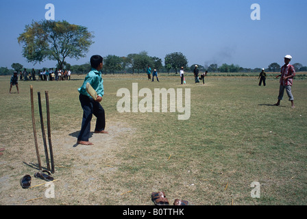 Rural cricket in a village in Bangladesh Stock Photo