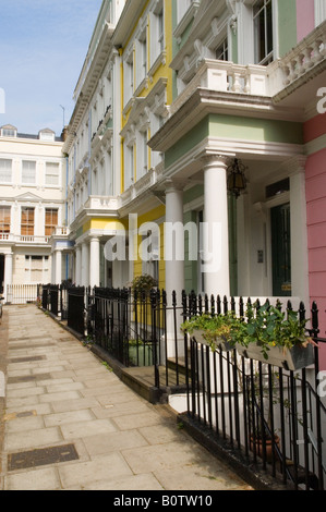 Georgian large terraced row family house Painted colourfully Chalcot Sq Square “Primrose Hill”  London NW1 Uk HOMER SYKES Stock Photo