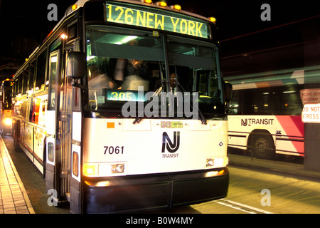 Port Authority Bus Terminal Building of New York and New Jersey bus depot interior.  Midtown Manhattan New York City. Public transportation. Bus parked Stock Photo