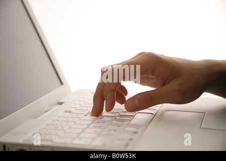 Woman using laptop Stock Photo