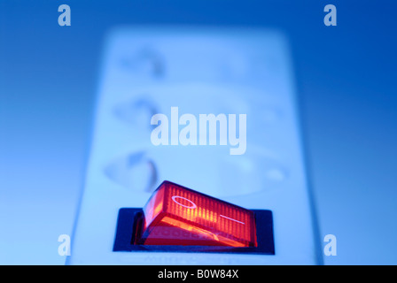 On/off switch on an electrical outlet (socket), power bar Stock Photo