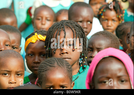 Girl among a group of children at a kindergarten in Garoua, Cameroon, Africa Stock Photo