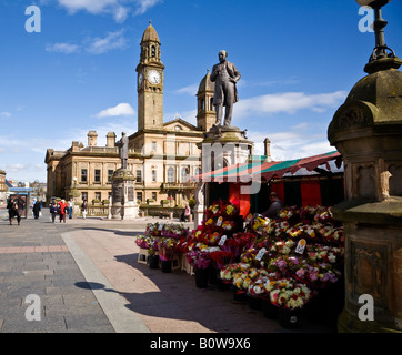 A flower stall and Town Hall at Paisley Cross, Paisley, Renfrewshire, Scotland. Stock Photo