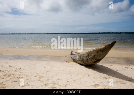 Logboat or dugout boat on a beach in Manambato, Madagascar, Africa Stock Photo