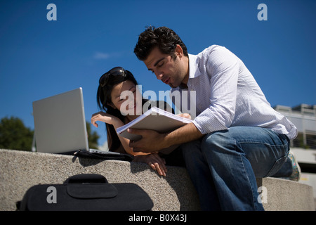 University students studying on campus Stock Photo