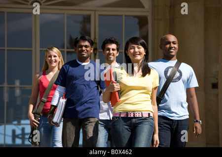 University students walking on campus Stock Photo