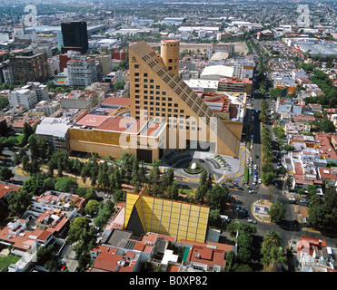 aerial above Polanco Plalacio de Hierro department store Mexico City and packed Gigante supermarket lot in right background Stock Photo
