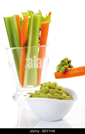 Guacamole with vegetable sticks Stock Photo
