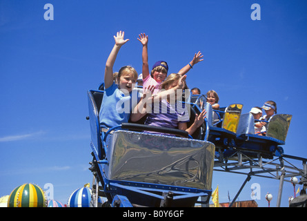 Children have fun on a roller coaster at the Deschutes County Fair in Redmond in July Stock Photo