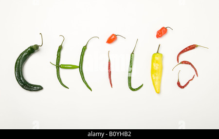 The word Chilis spelled out using various peppers Stock Photo