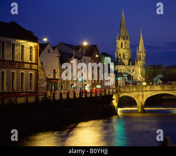 St Finbarre's Cathedral seen across the River Lee, City of Cork, Eire. Stock Photo