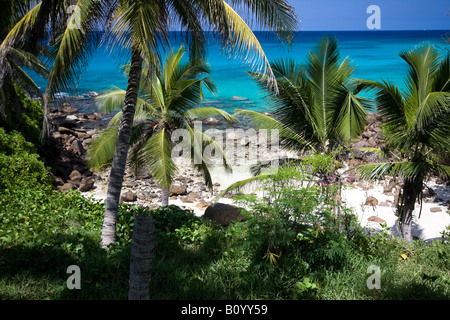 Hidden and secluded bay overlooking tropical beach in Seychelles Stock Photo