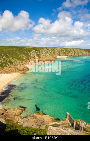 Rugged Cornish coastline with turquoise sea and blue sky Stock Photo