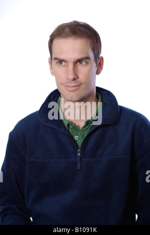 Studio portrait of casually dressed man in his thirties Stock Photo