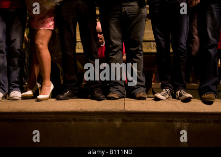 Delirious Manchester United fans celebrate outside Manchester's Town Hall after their team won the Champions League. Stock Photo