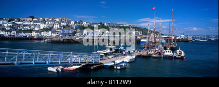 View across Brixham Marina, Devon, UK, with boats on a pontoon Stock Photo