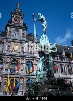 The statue of Brabo and the giant's hand, in the Grote Markt (main square) with City Hall behind Stock Photo