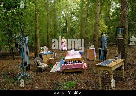 Woman in forest bedroom Stock Photo