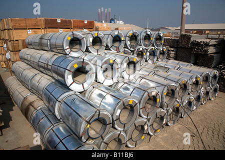 General Cargo goods in particular steel rolls and timber in yard at Port Khalid United Arab Emirates Middle East Stock Photo