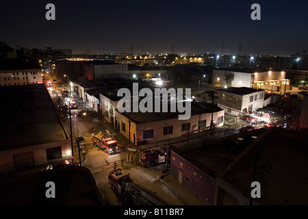 Fire engines arriving at downtown fire Stock Photo