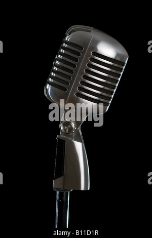 Retro microphone isolated on the black background Stock Photo