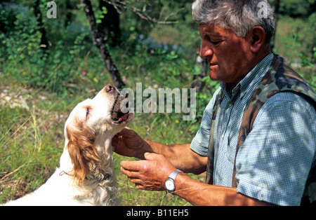 italy umbria valnerina a man hunting truffles with his dog Stock Photo