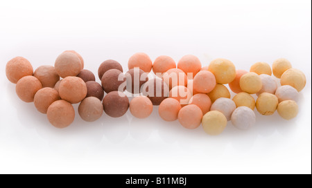 Close up of face powder balls on isolated background Stock Photo