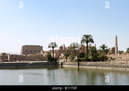 Precinct of Amun from across the Sacred Lake, Temple of Karnak, Luxor, Nile Valley, Egypt Stock Photo