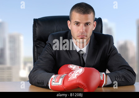 Businessman in Boxing Gloves Stock Photo