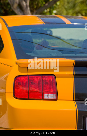 Rear quarter of Ford Mustang in Grapper Orange color Stock Photo