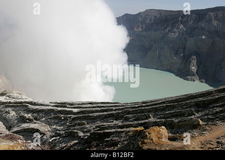 Turquoise sulphur lake in the crator of the active volcano, Ijen plateau, East Java, Indonesia, South East Asia Stock Photo