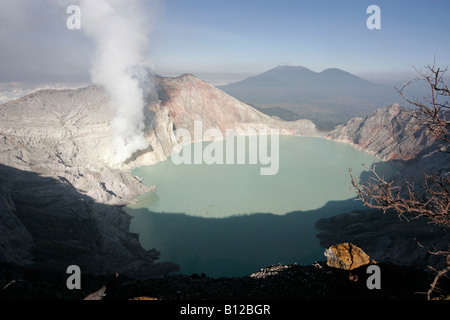 Turquoise sulphur lake in the crator of the active volcano, Ijen plateau, East Java, Indonesia, South East Asia Stock Photo